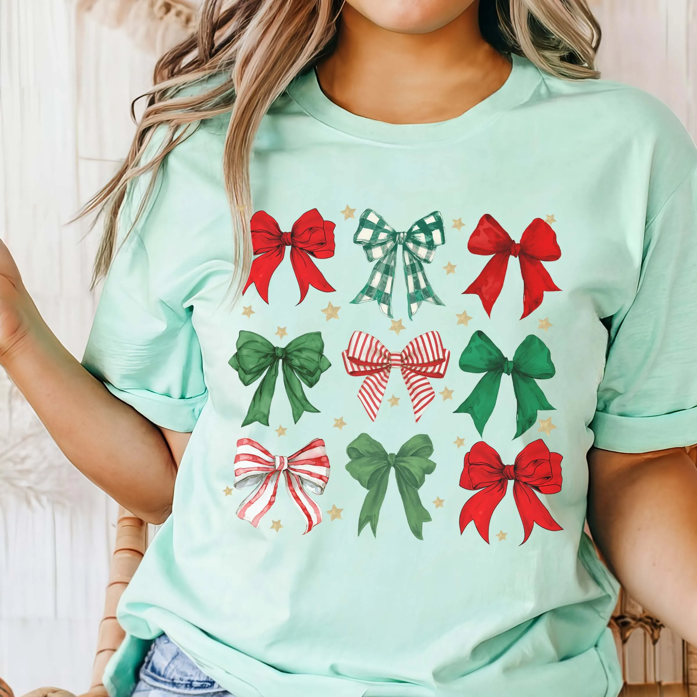 Red & Green Christmas Bow Collage Bella Graphic Tee sold by Roxie’s Picks product image thumbnail 3