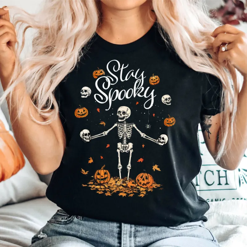 Stay Spooky Cute Skeleton And Pumpkins Halloween Graphic Tee sold by Roxie’s Picks