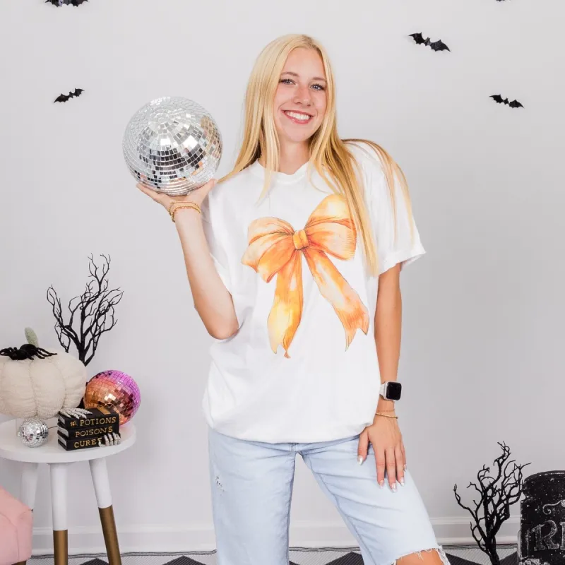 Orange Bow Comfort Color Graphic Tee sold by Roxie’s Picks