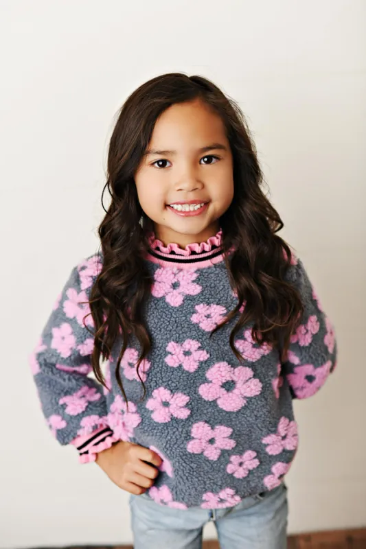 Pink Daisy Sweater sold by Roxie’s Picks
