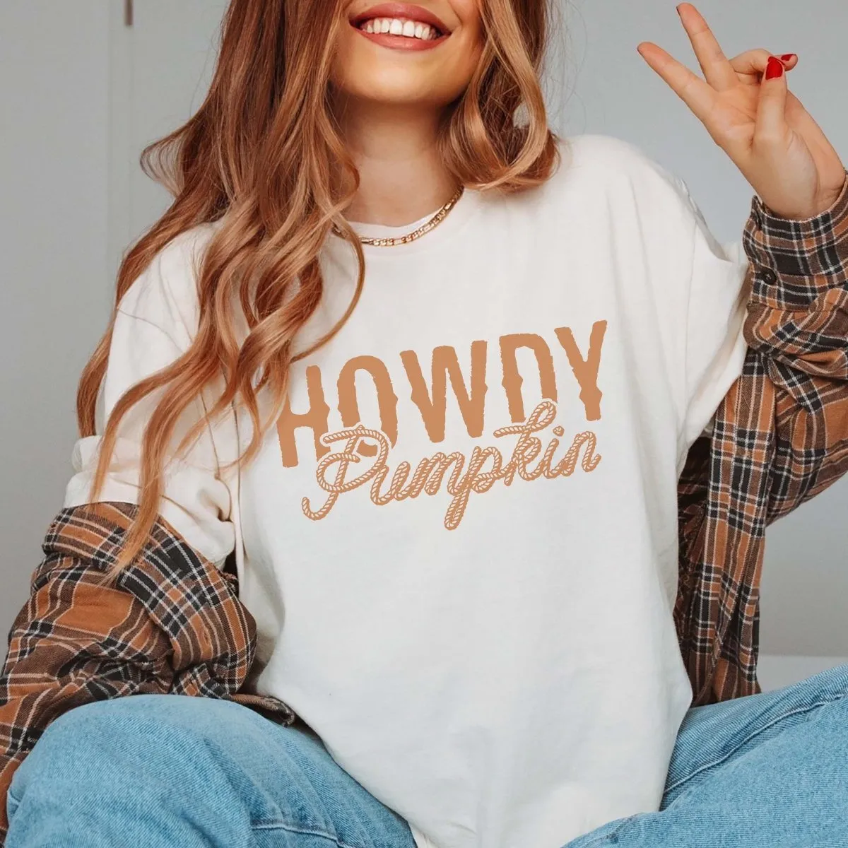 Howdy Pumpkin Comfort Color Graphic Tee sold by Roxie’s Picks