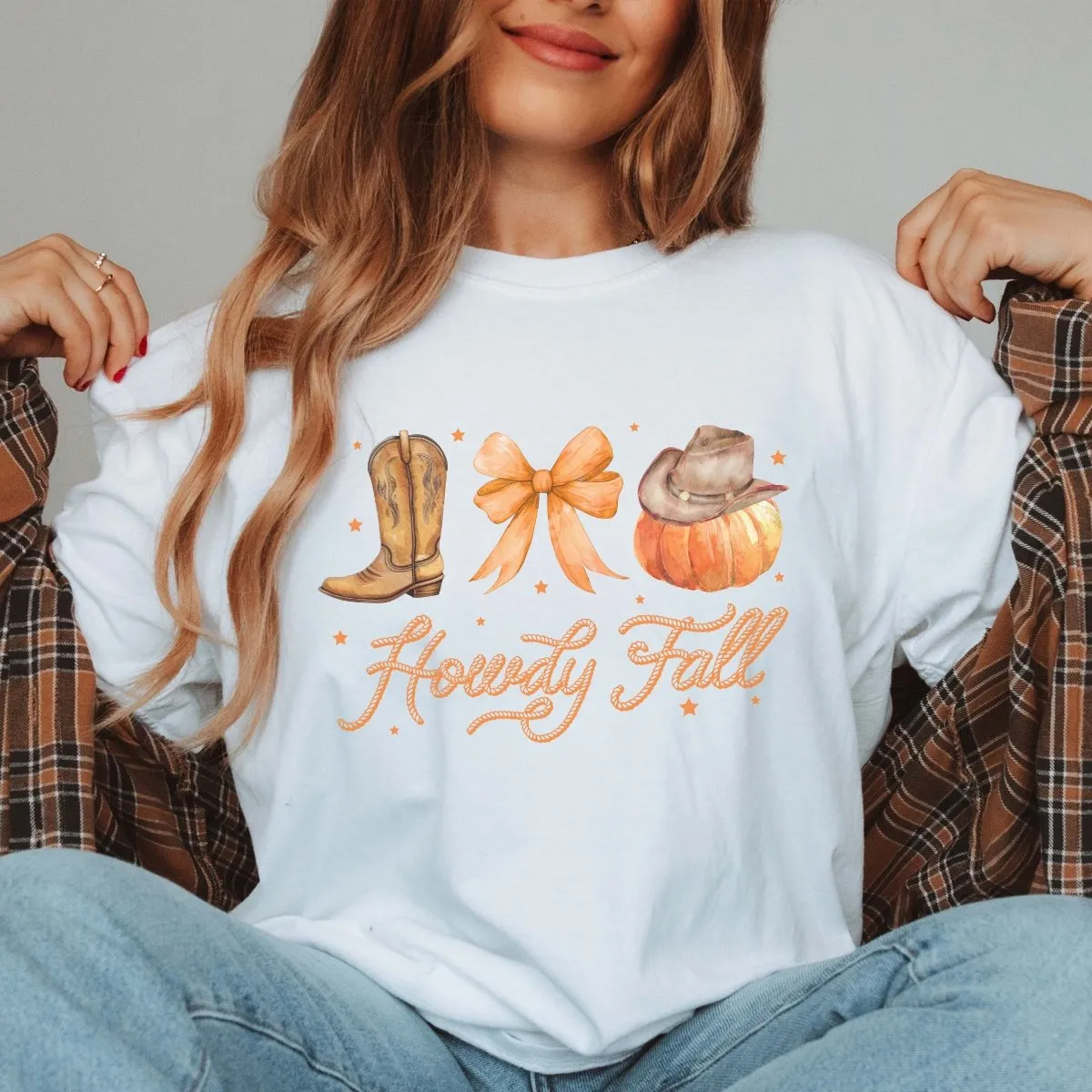 Howdy Fall Boot Bow Pumpkin Comfort Color Graphic Tee sold by Roxie’s Picks