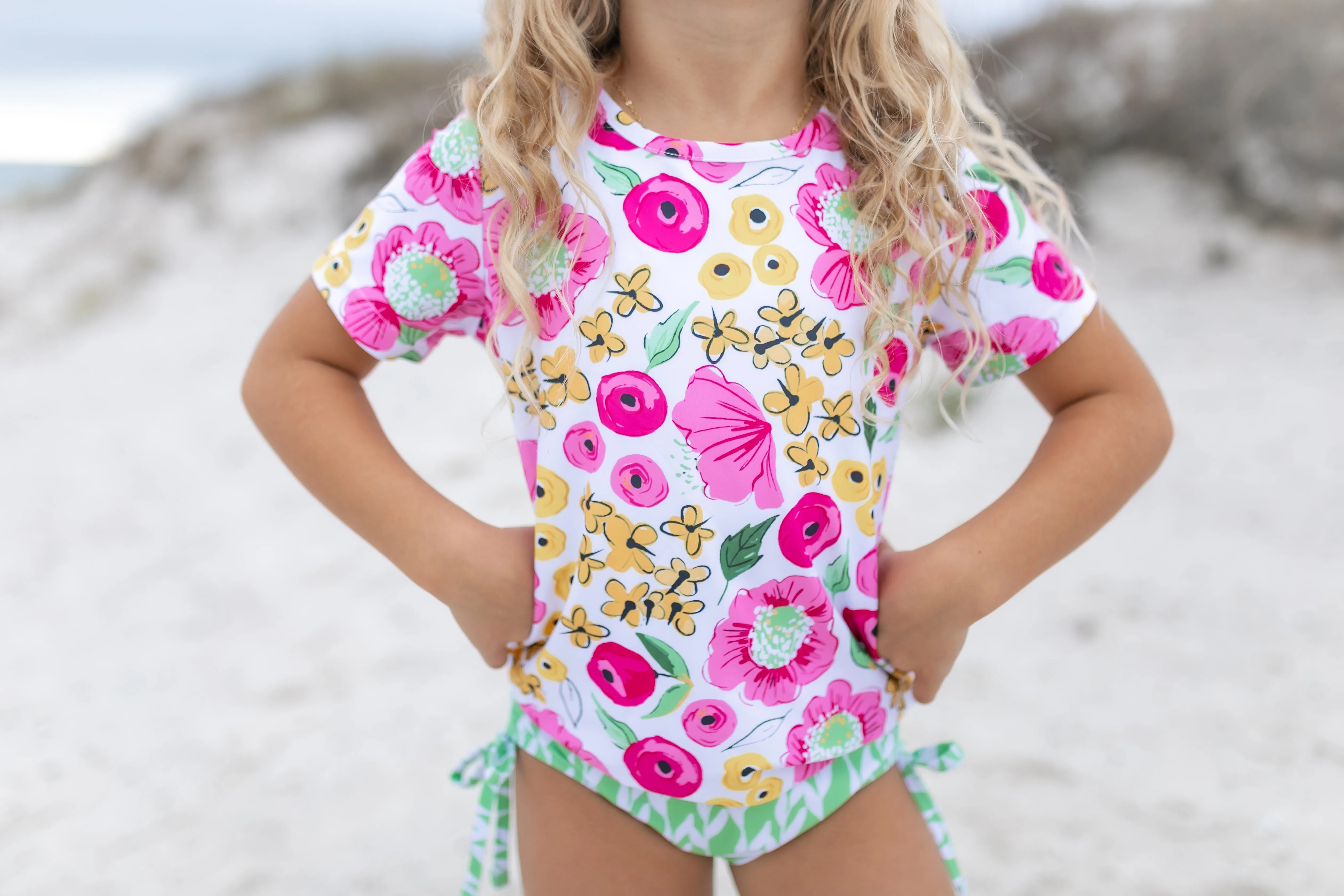 Olivia Green Pink Floral Rash Guard Swimsuit sold by Roxie’s Picks