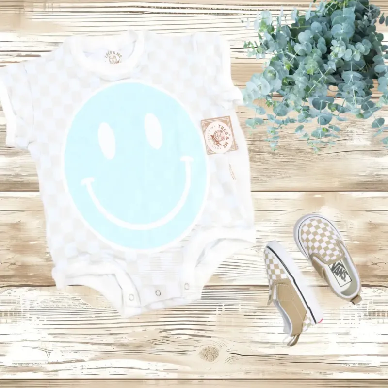 Theo & Me Unisex Tan Check Happy Face Bubble Romper sold by Roxie’s Picks