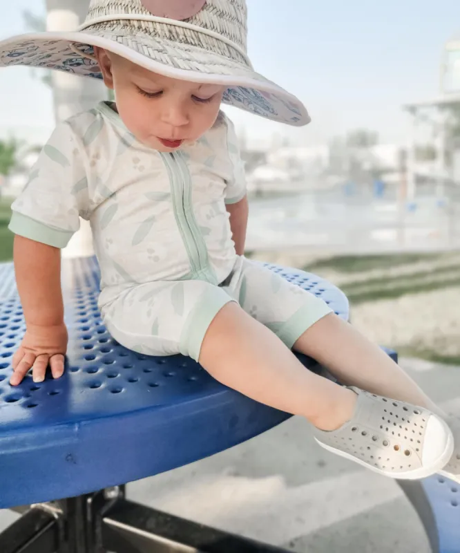 Theo & Me Unisex Tan Skull & Palm Tree Surf Summer Shorties Sleeper sold by Roxie’s Picks