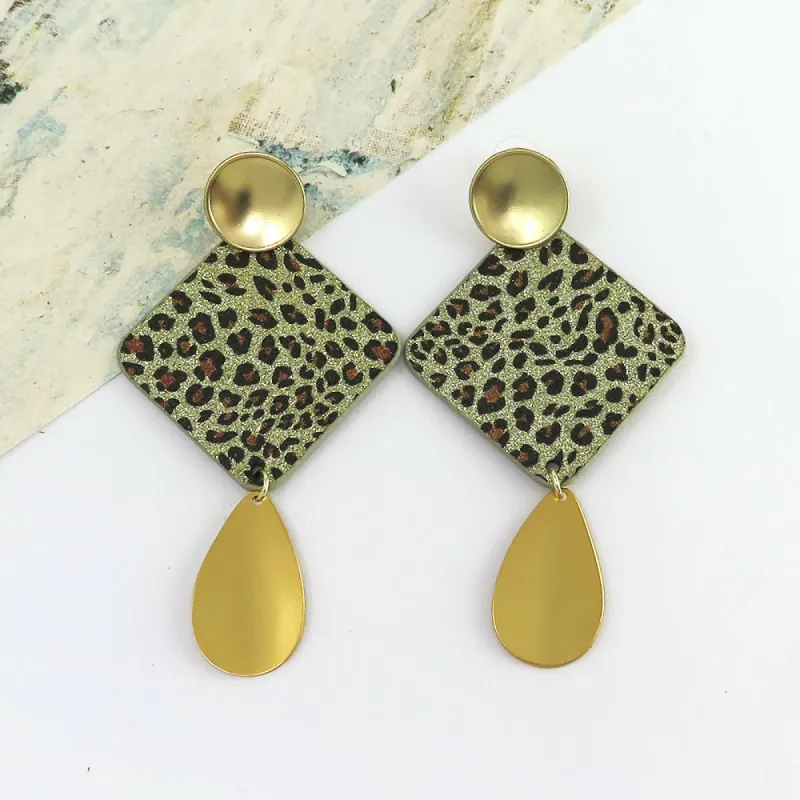 Gold Cheetah Animal Print Dangle Earrings sold by Roxie’s Picks