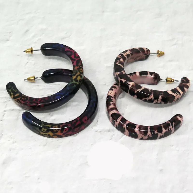 Lucite Animal Print Hoop Earrings sold by Roxie’s Picks