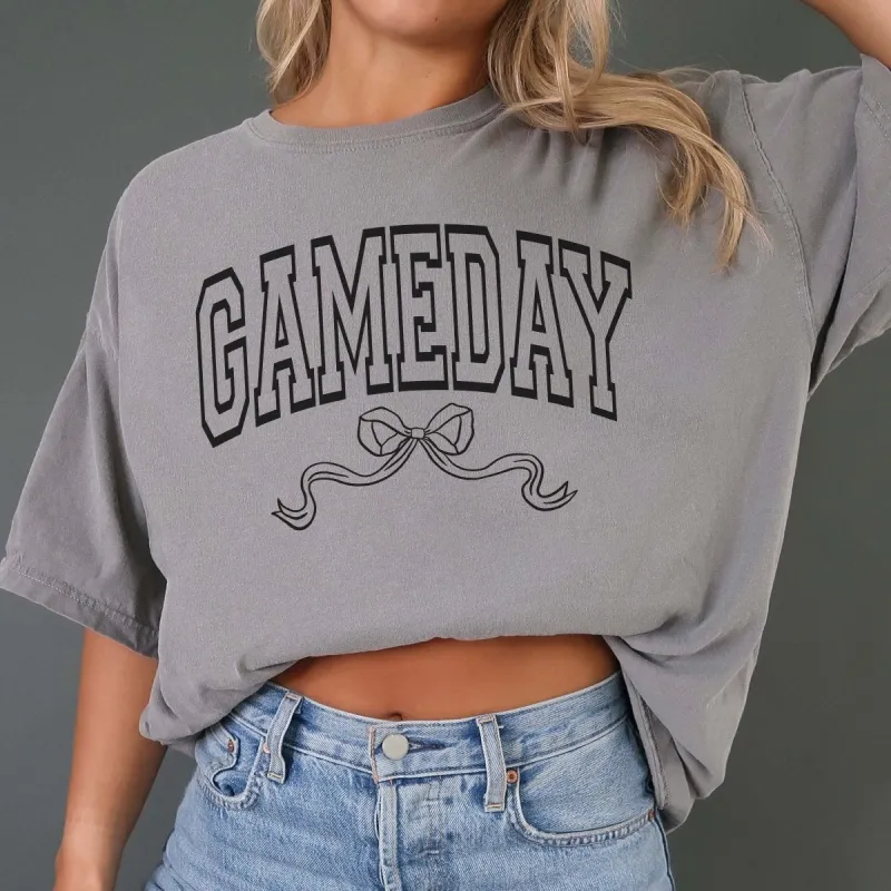 Gameday Bow Comfort Color Tee sold by Roxie’s Picks
