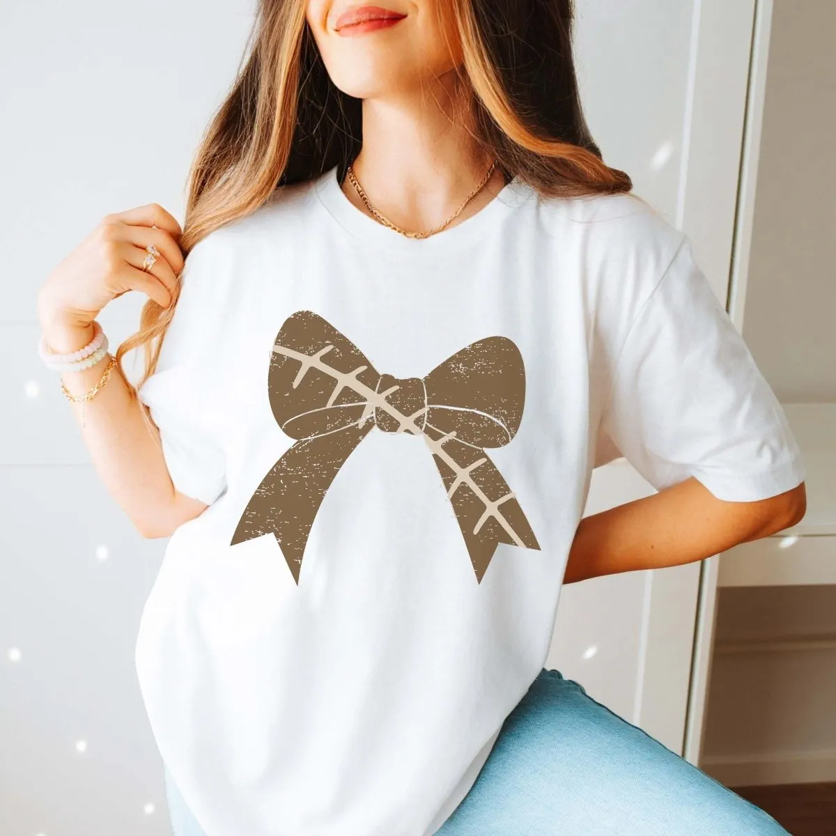 Football Large Bow Graphic Tee sold by Roxie’s Picks product image thumbnail 2