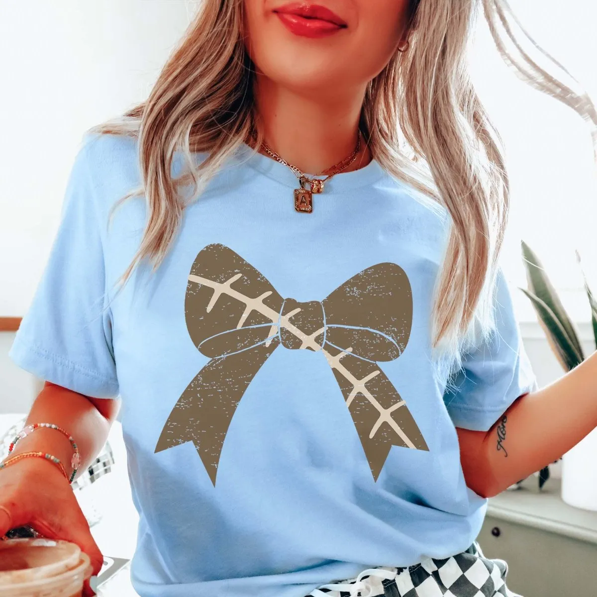 Football Large Bow Graphic Tee sold by Roxie’s Picks product image thumbnail 3