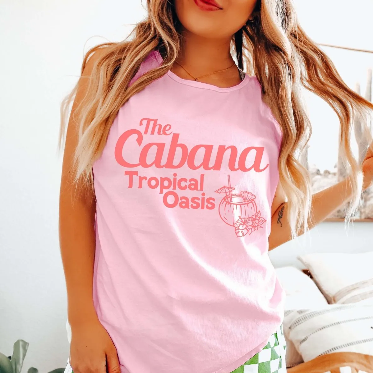 The Cabana Tropical Oasis Comfort Color Tank sold by Roxie’s Picks