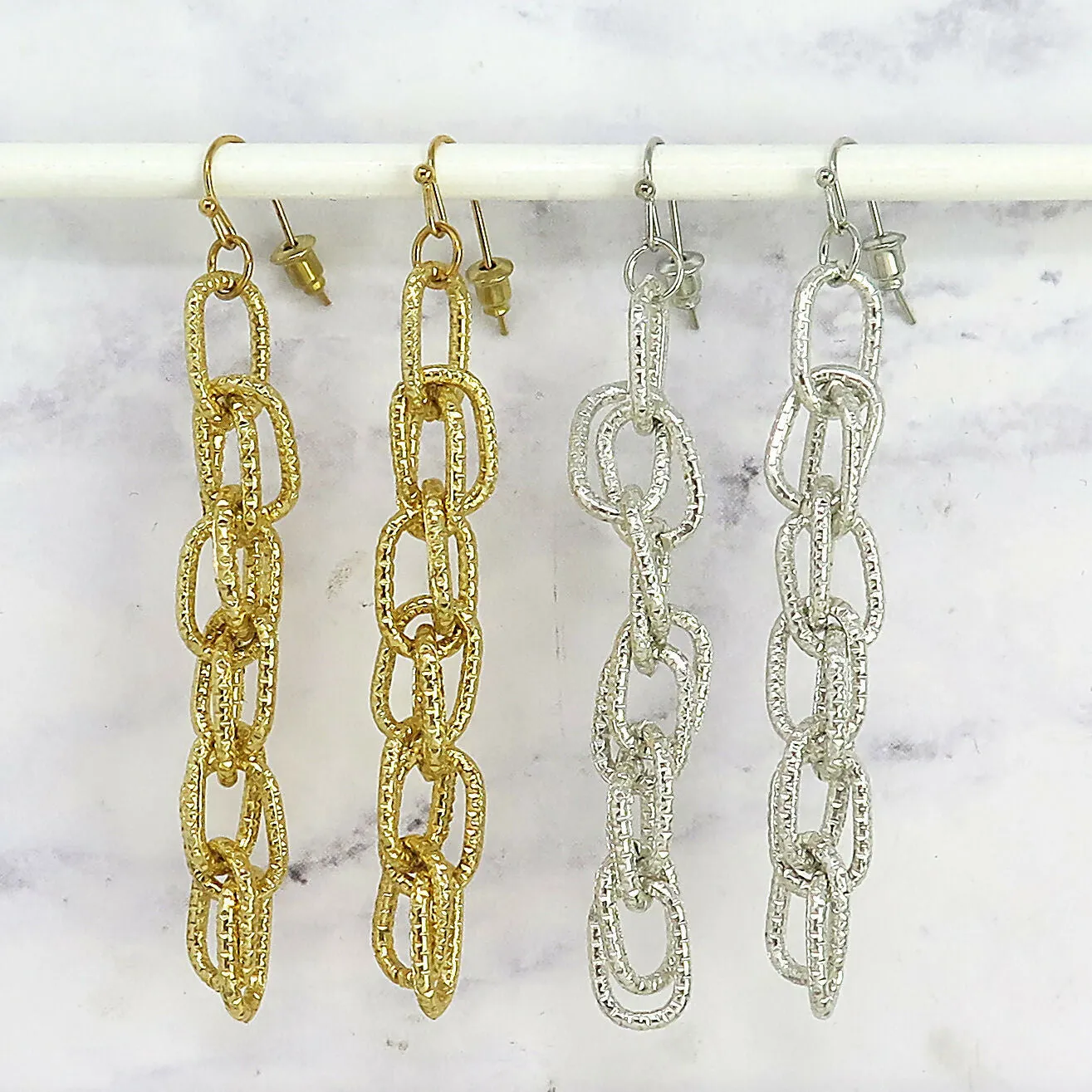 Gold Textured Chain Link Dangle Earrings sold by Roxie’s Picks