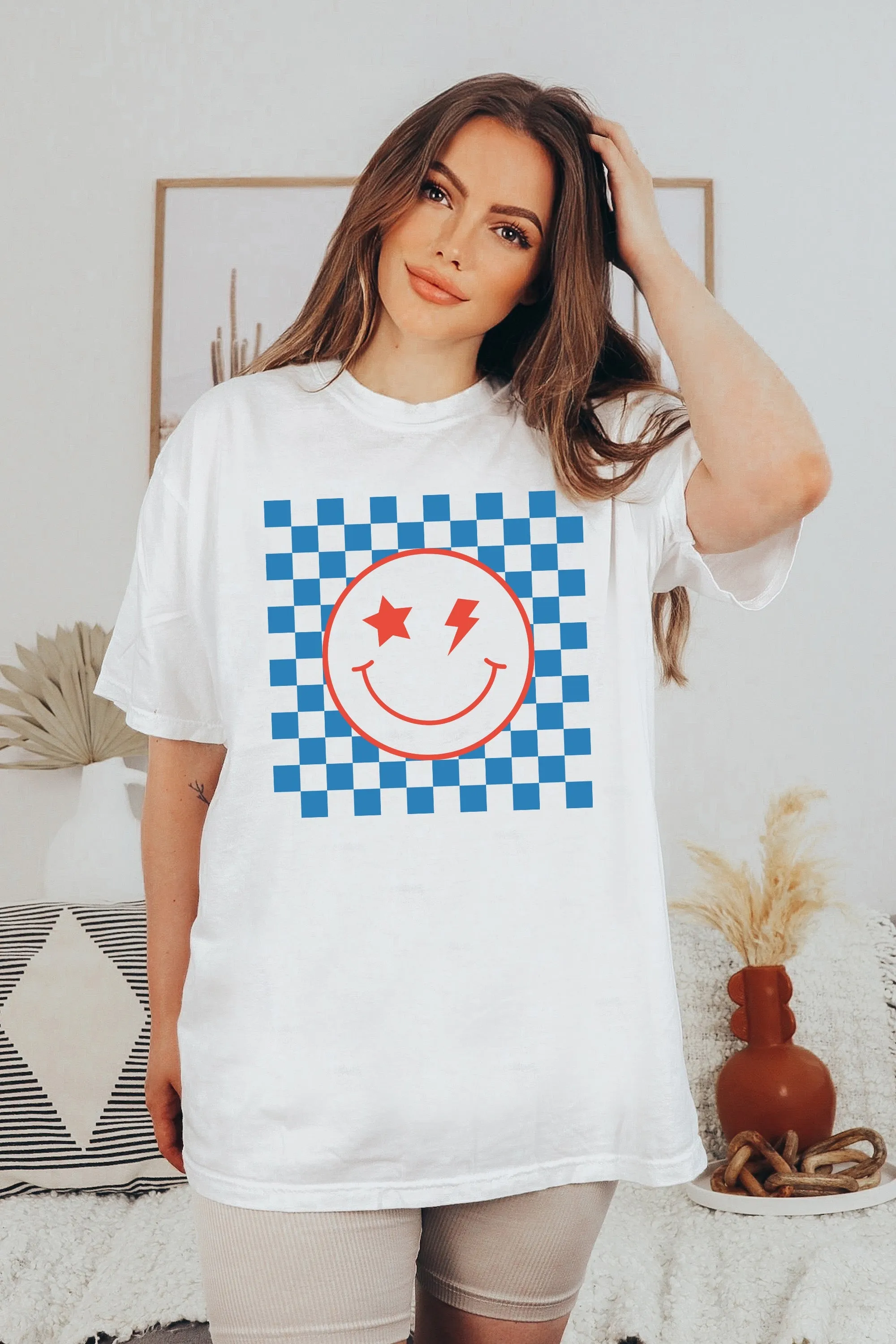 Checkered Smiley Face T-Shirt or Crew Sweatshirt sold by Roxie’s Picks