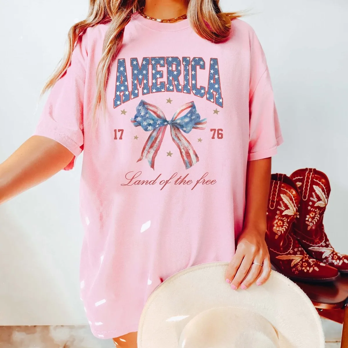 America Land Of The Free Bow Comfort Color Tee sold by Roxie’s Picks product image thumbnail 4