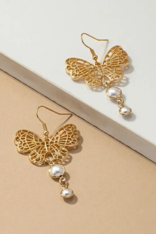 Filigree butterfly with pearl drop earrings sold by Roxie’s Picks