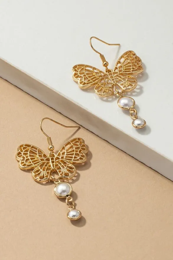 Filigree butterfly with pearl drop earrings sold by Roxie’s Picks
