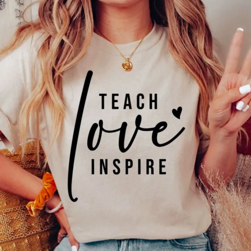 Teach Love Inspire T-Shirt or Crew Sweatshirt sold by Roxie’s Picks