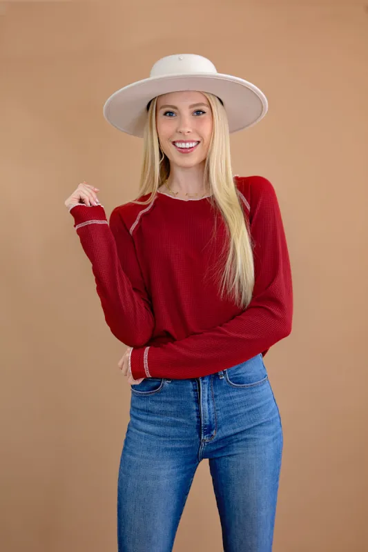 Textured Round Neck Long Sleeve Top sold by Roxie’s Picks