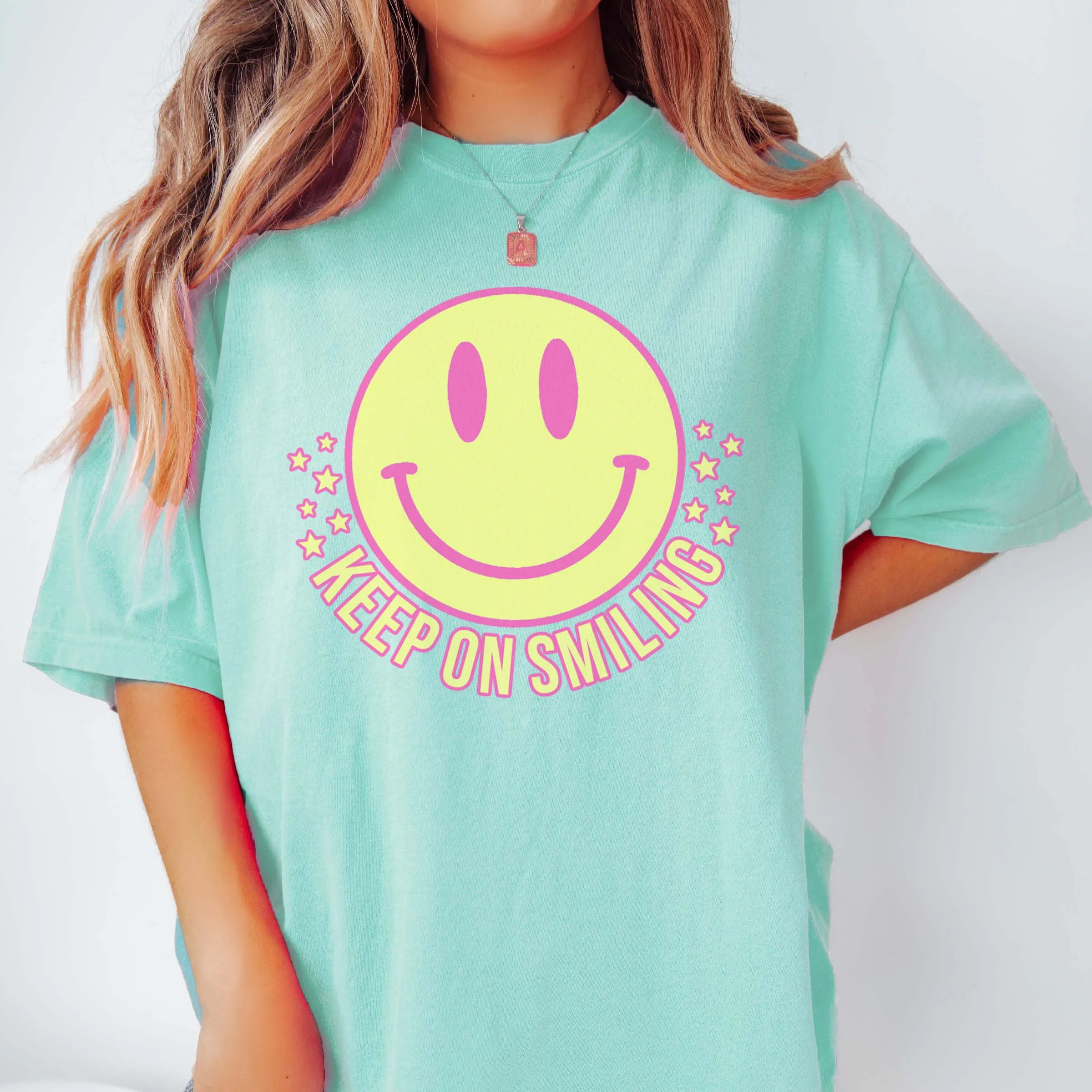 Keep On Smiling Comfort Color Tee sold by Roxie’s Picks