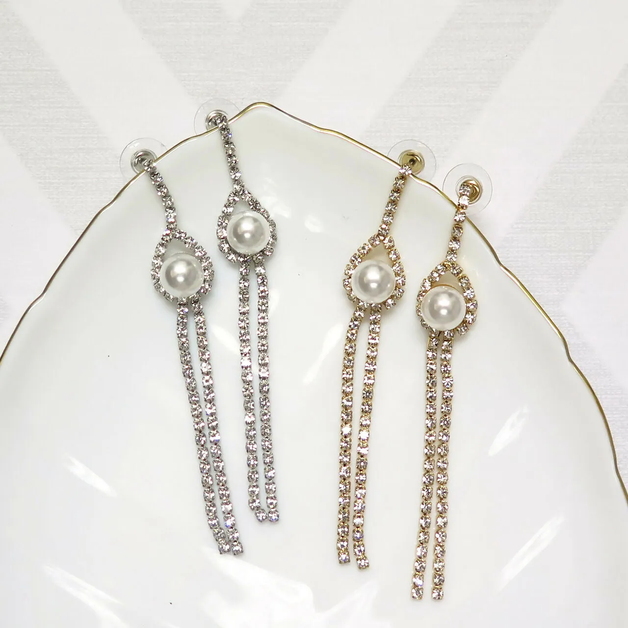 Pearl and Crystal Dangle Earrings sold by Roxie’s Picks
