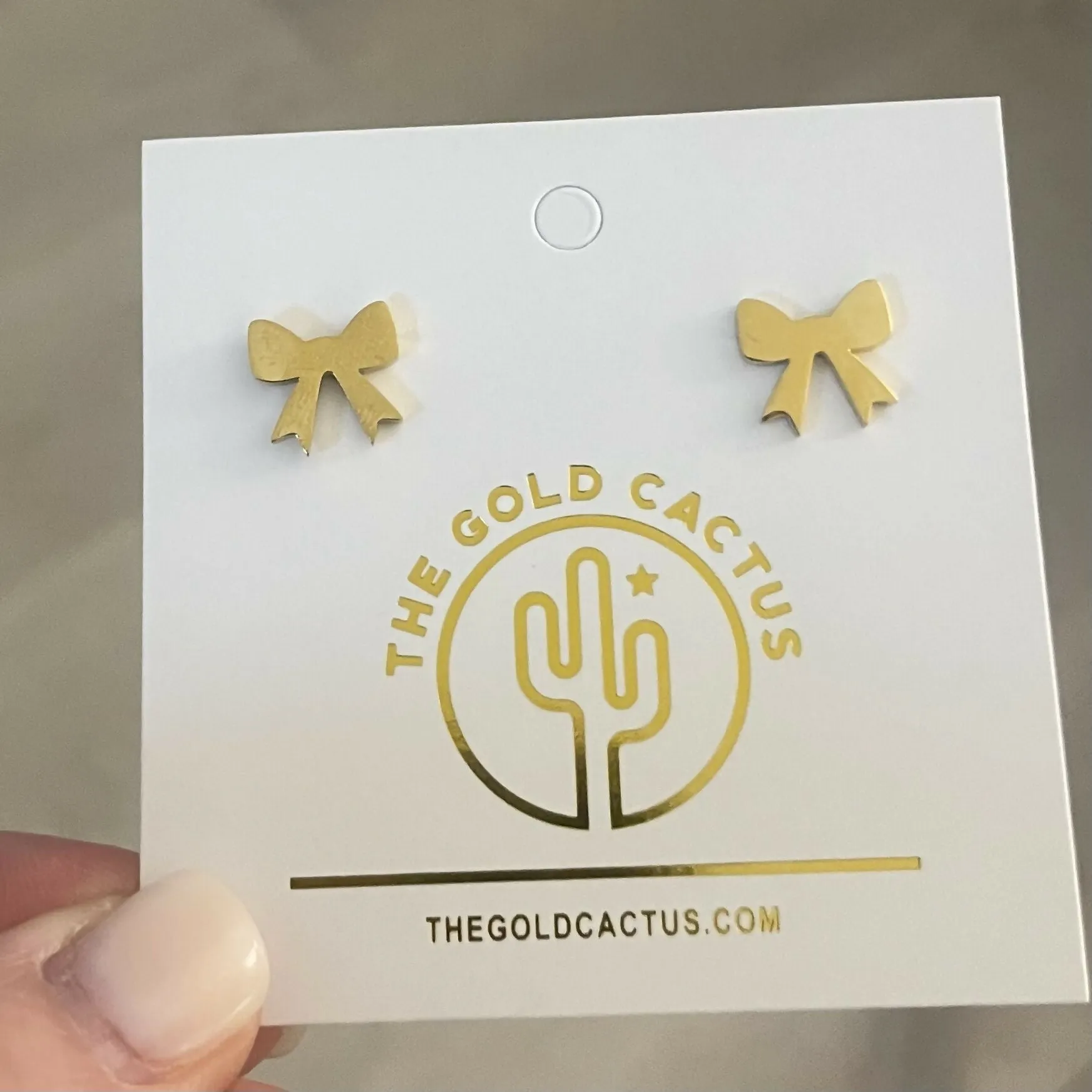Gold Bow Earrings sold by Roxie’s Picks