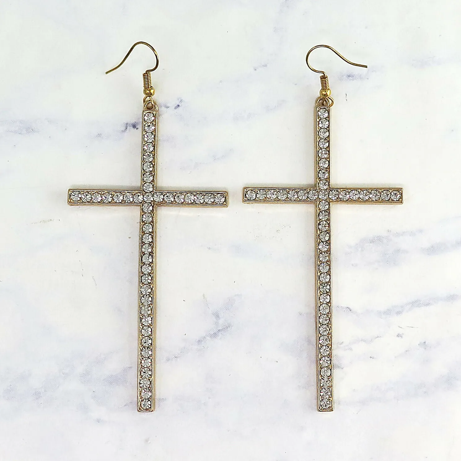 Gold Crystal Cross Dangle Earrings sold by Roxie’s Picks