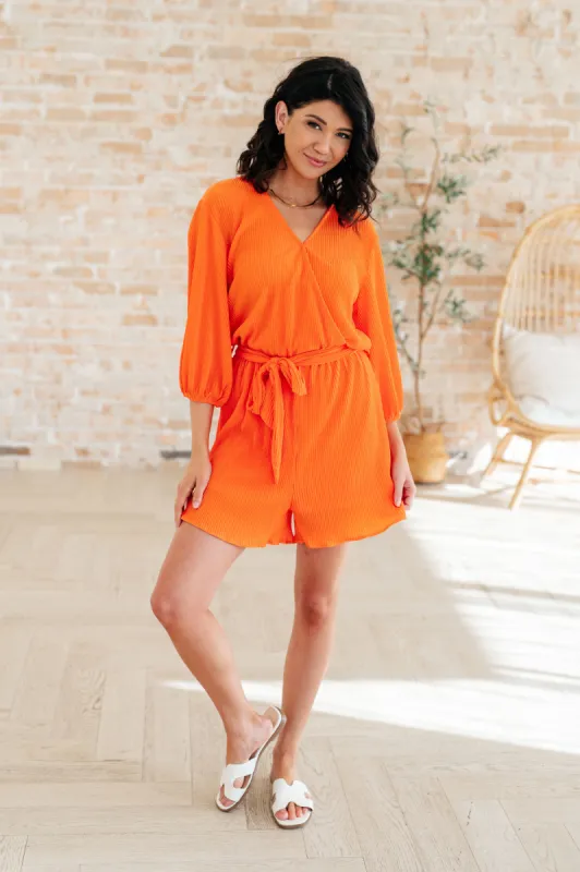 Roll With me Romper in Tangerine sold by Roxie’s Picks