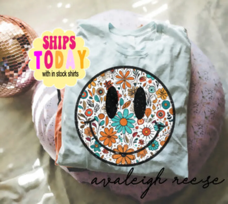 Floral Smiley Face Shirt sold by Roxie’s Picks