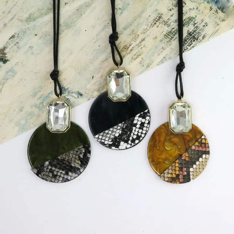 Lucite Animal Print Leather & Crystal Pendant Necklace sold by Roxie’s Picks
