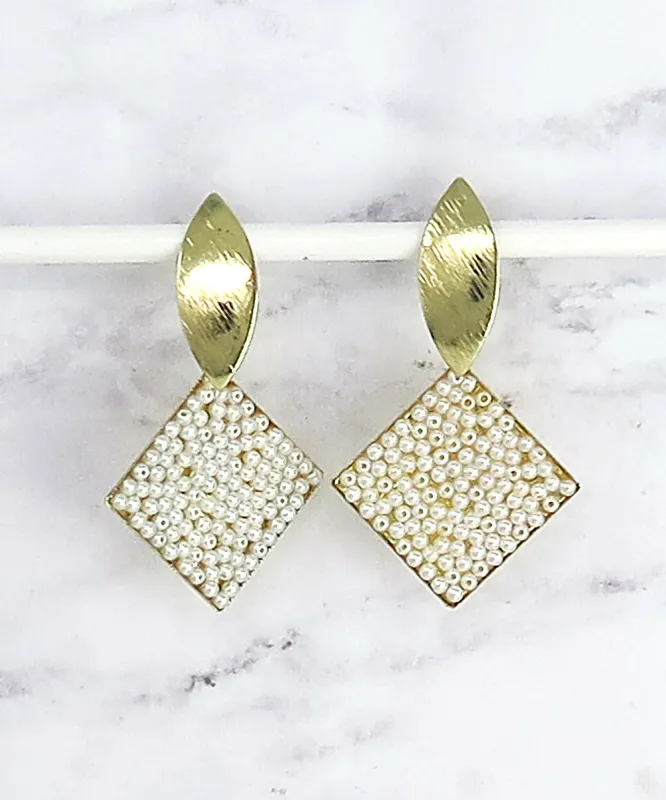 Gold Pave Pearl Statement Drop Earrings sold by Roxie’s Picks