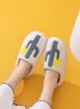 Cactus Sherpa Fuzzy Slippers sold by Roxie’s Picks