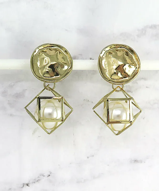 Gold Caged Pearl Statement Drop Earrings sold by Roxie’s Picks