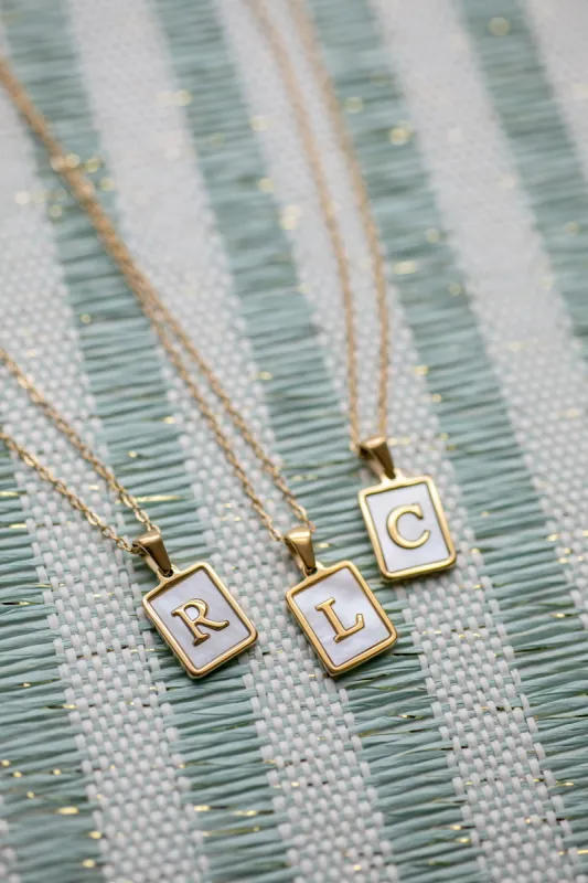 Pretty Mother of Pearl Initial Necklace sold by Roxie’s Picks