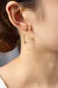 Butterfly stationed hoop earrings sold by Roxie’s Picks