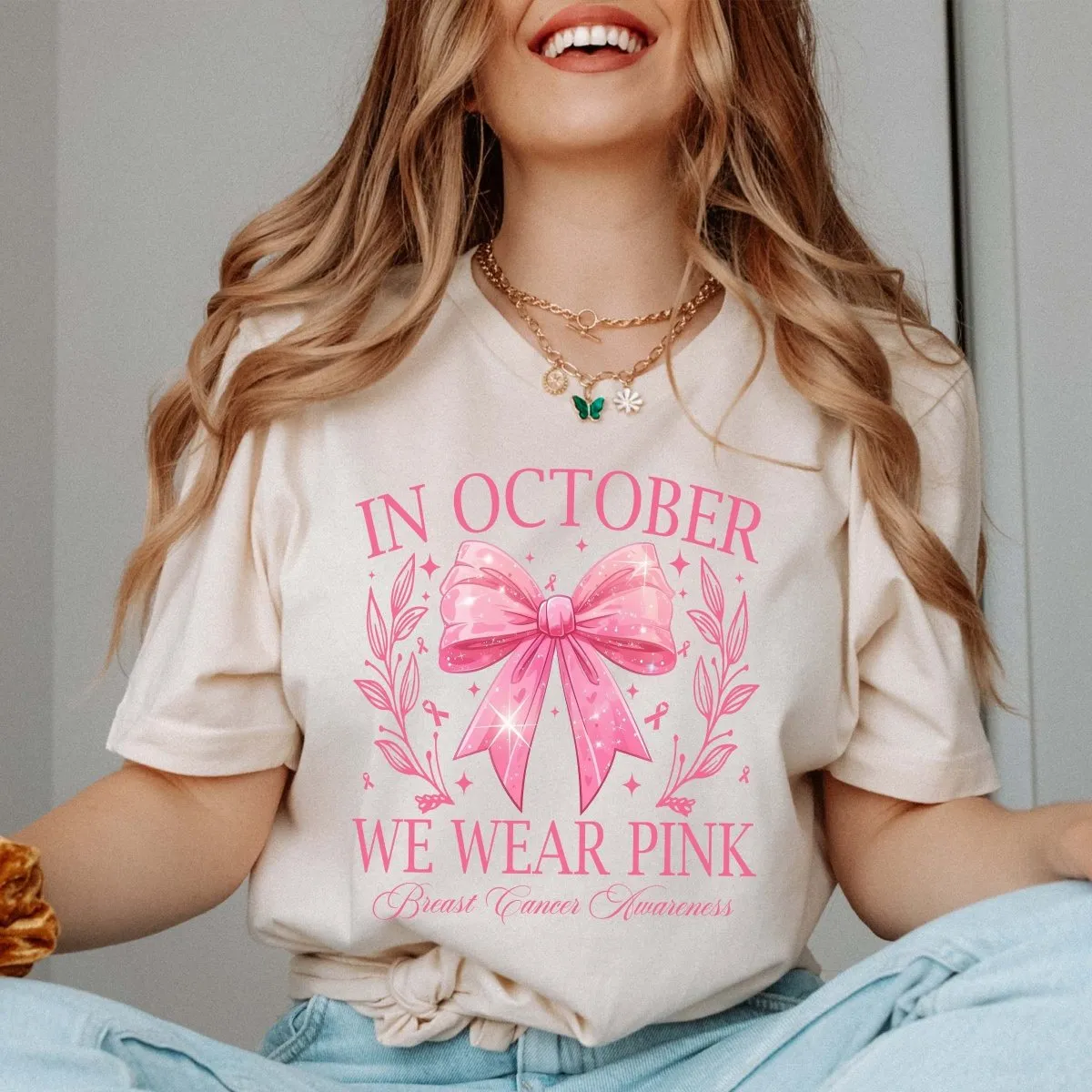 We Wear Pink Bow With Stars Bella Graphic Tee sold by Roxie’s Picks product image thumbnail 2
