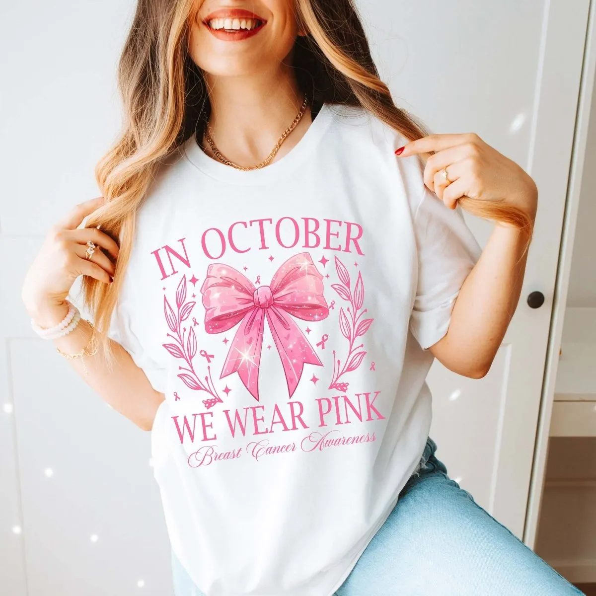 We Wear Pink Bow With Stars Bella Graphic Tee sold by Roxie’s Picks
