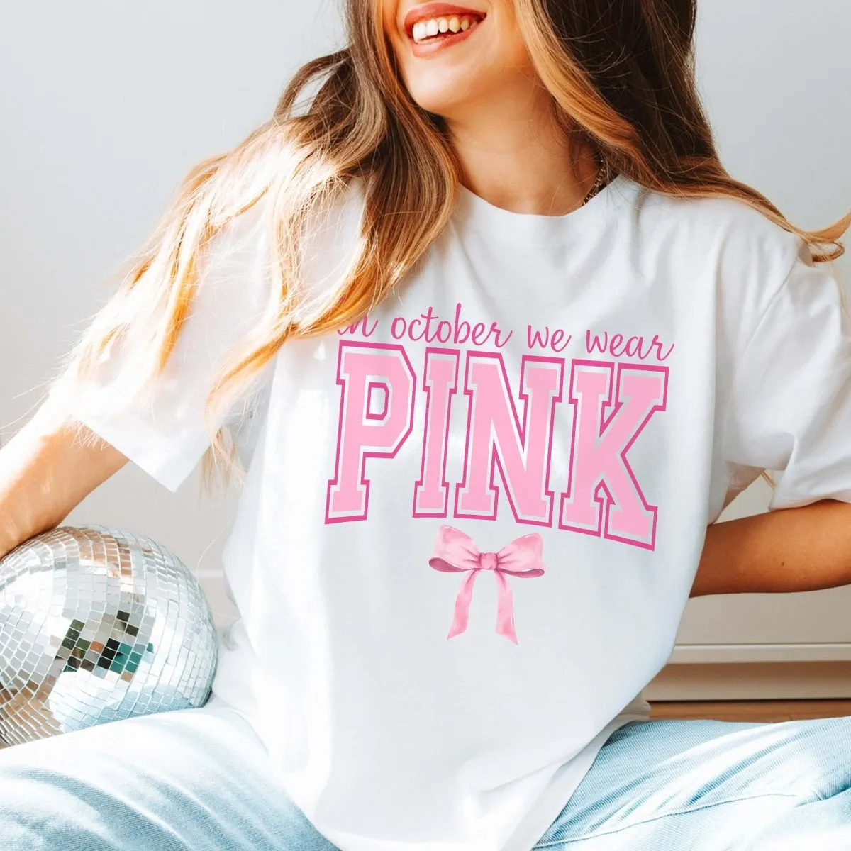 In October We Wear Pink Bow Bella Graphic Tee sold by Roxie’s Picks product image thumbnail 3