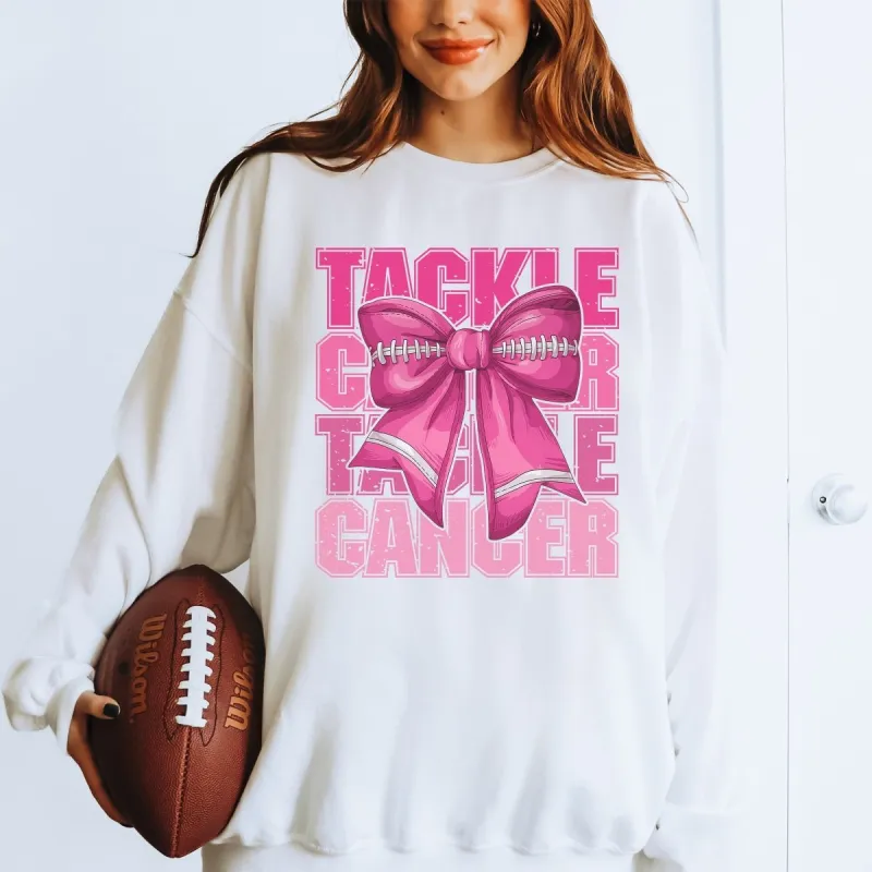 Tackle Cancer Football Bow Graphic Sweatshirt sold by Roxie’s Picks