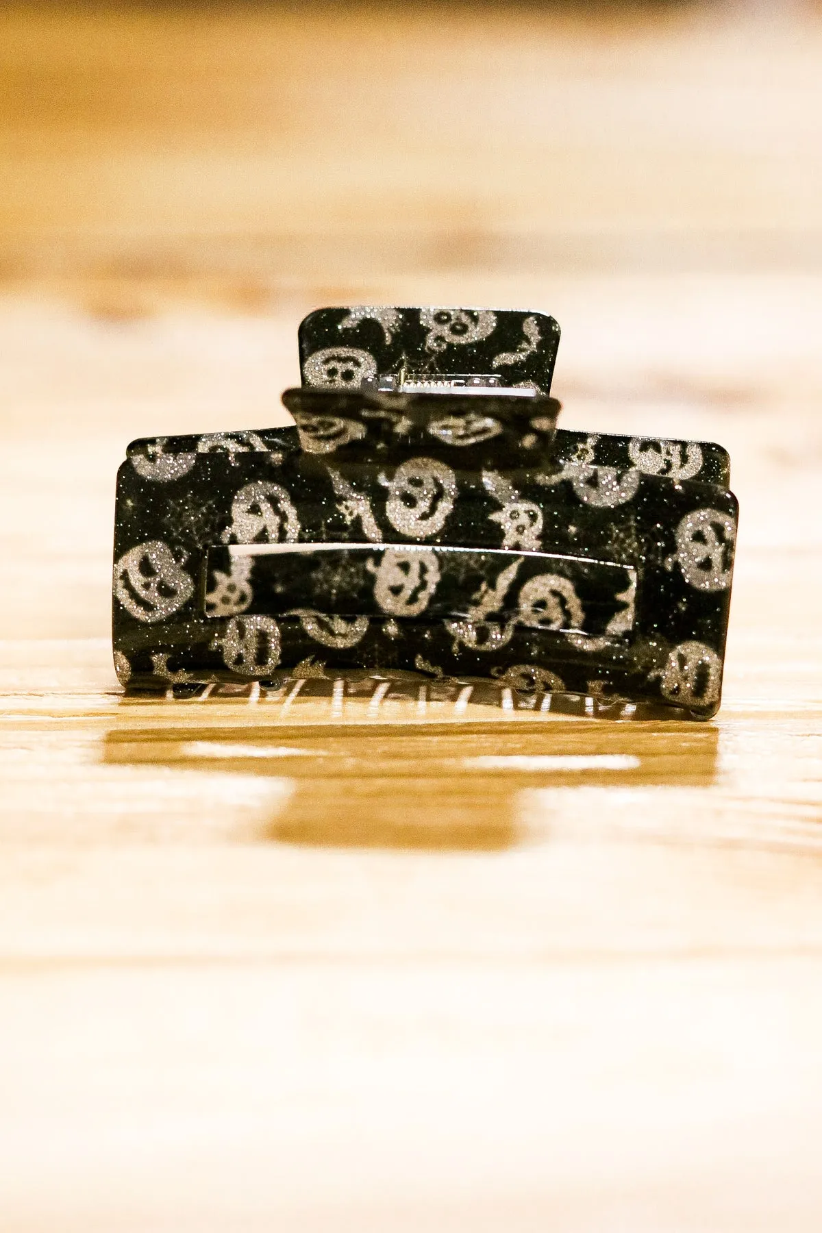 Silver & Black Glitter Jack-O-Lantern Halloween Hair Claw sold by Roxie’s Picks