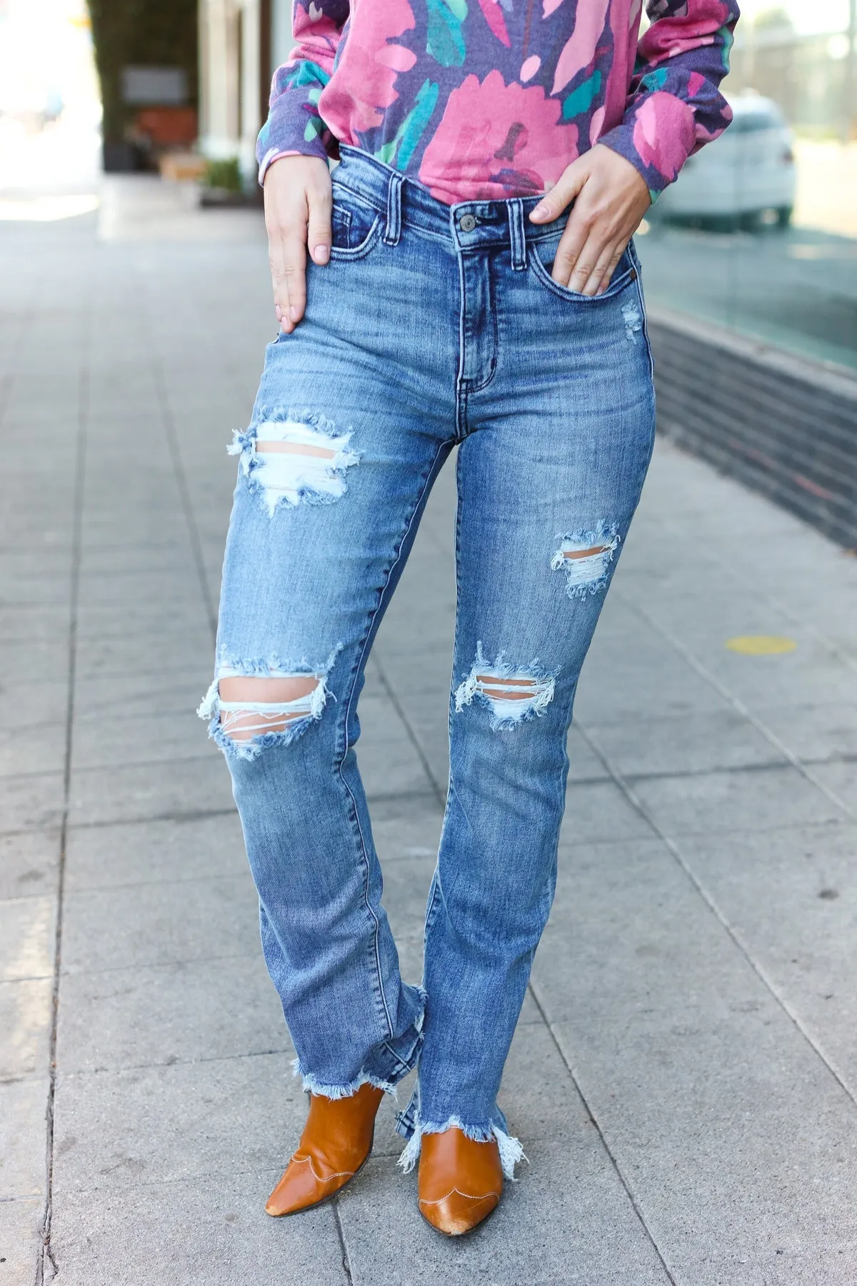 Judy Blue Medium Wash Mid Rise Distressed Straight Leg Jeans sold by Roxie’s Picks
