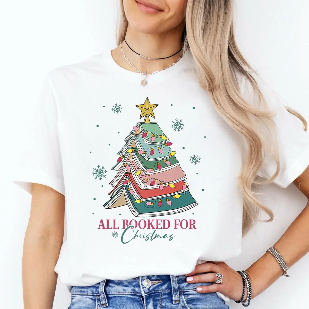 All Booked For Christmas Graphic Tee sold by Roxie’s Picks