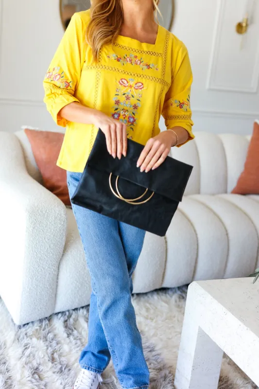 Black Fold Over Gold O-Ring Faux Leather Clutch sold by Roxie’s Picks