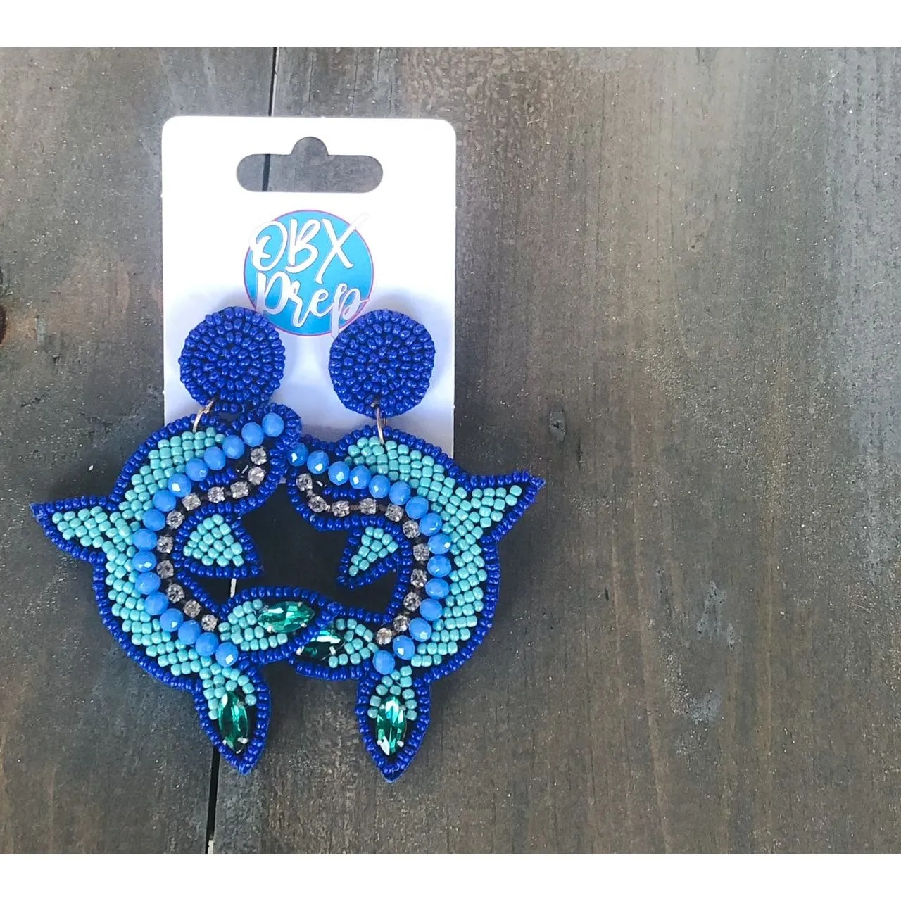 Dolphin Seed Beaded Dangle Earrings sold by Roxie’s Picks