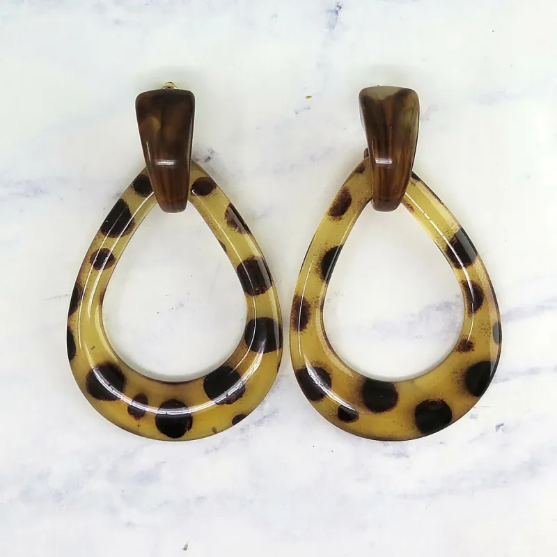 Lucite Animal Print Teardrop Dangle Earrings sold by Roxie’s Picks