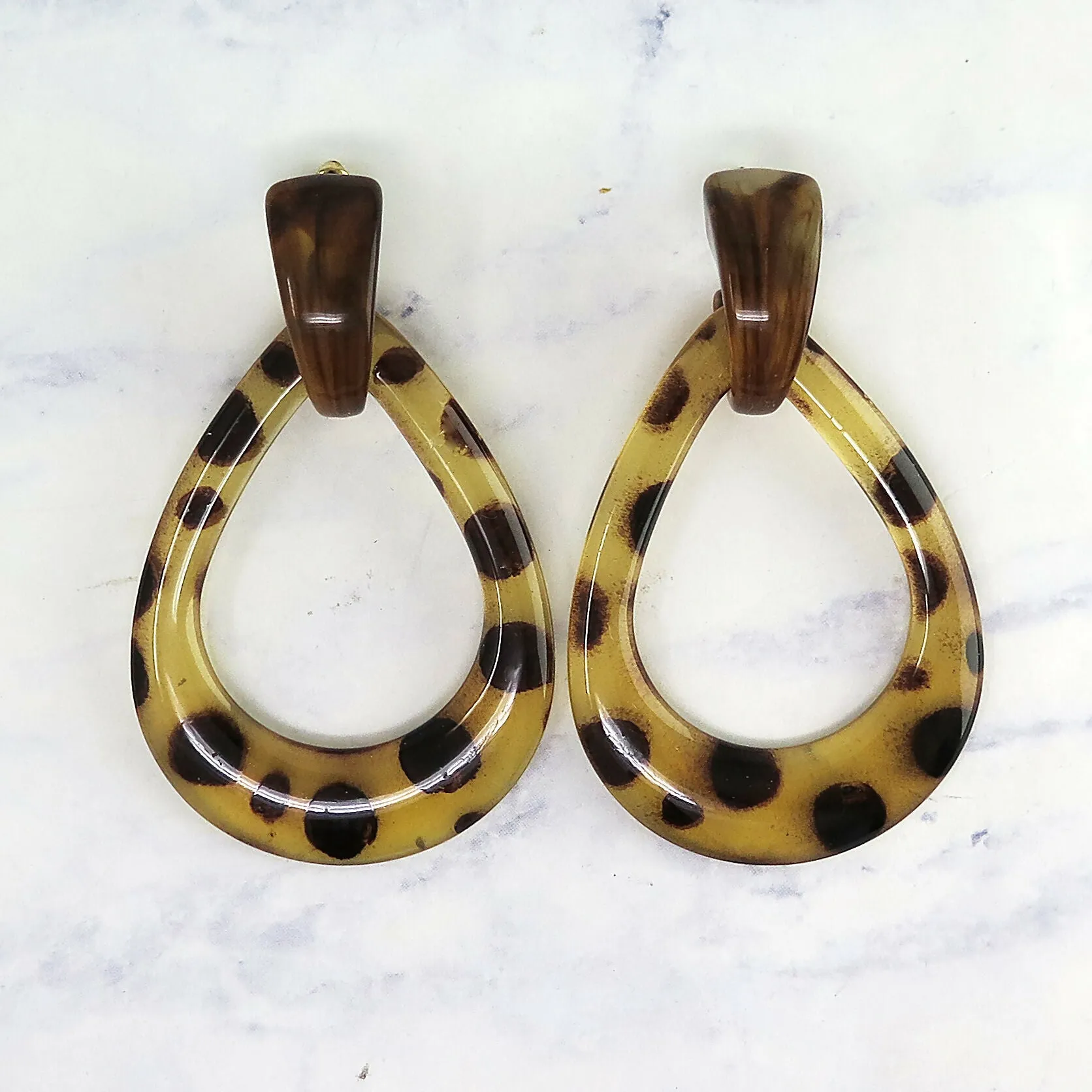 Lucite Animal Print Teardrop Dangle Earrings sold by Roxie’s Picks