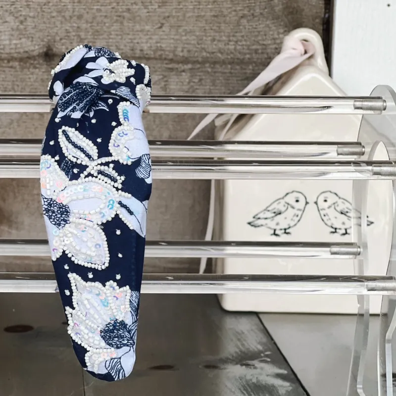 Classic Navy and White Floral Sequin and Seed Beaded Top Knot Headband sold by Roxie’s Picks