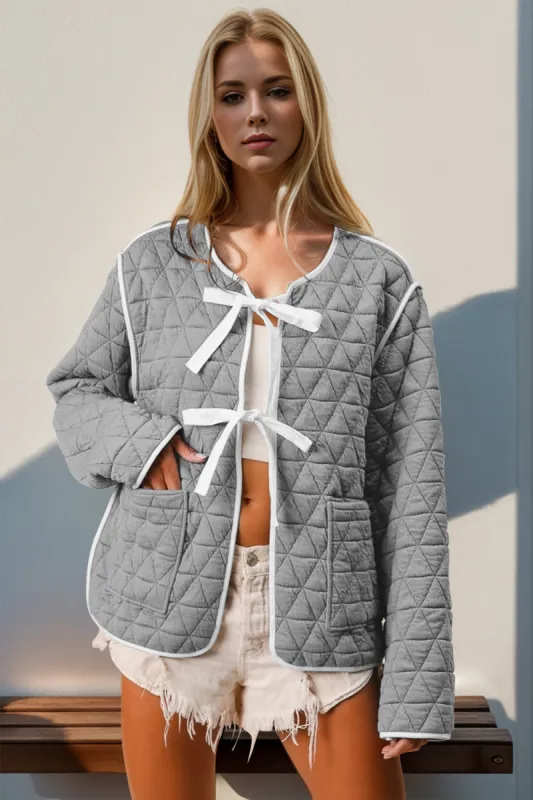 Contrast Trim Tie Front Quilted Jacket with Pockets sold by Roxie’s Picks