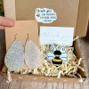 Heather Gold Shimmer Teardrop Earrings sold by Roxie’s Picks