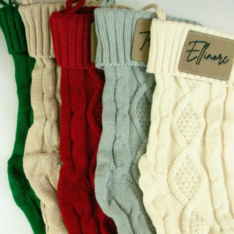 Farmhouse Cable Knitted Christmas Stocking with Personalized Leatherette Patch – 18-Inch sold by Roxie’s Picks