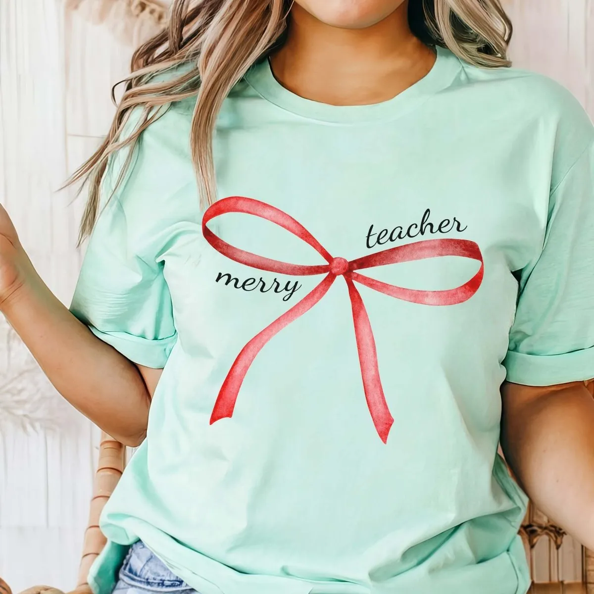 Merry Teacher Red Bow Bella Graphic Tee sold by Roxie’s Picks product image thumbnail 3